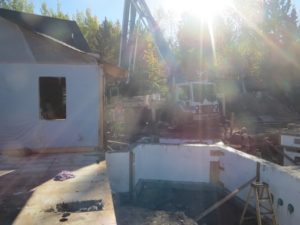 ICF walls, concrete boom truck, custom home construction