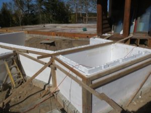 foundation walls for custom lake home addition, john huisman