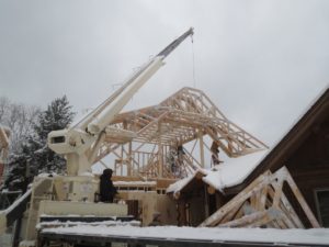 crane putting up trusses, picture by john Huisman