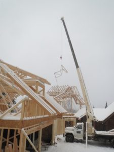 crane, frame trusses, lake home, ely mn