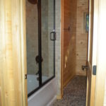 Basement bath, pebble floor