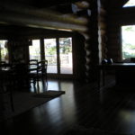 Dark hickory floor, log archway