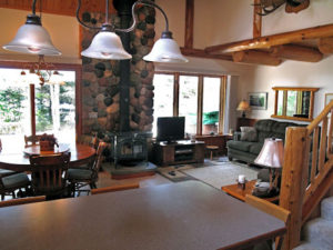 living room woodstove stone chimney