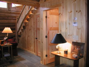 Stairs to loft in log home