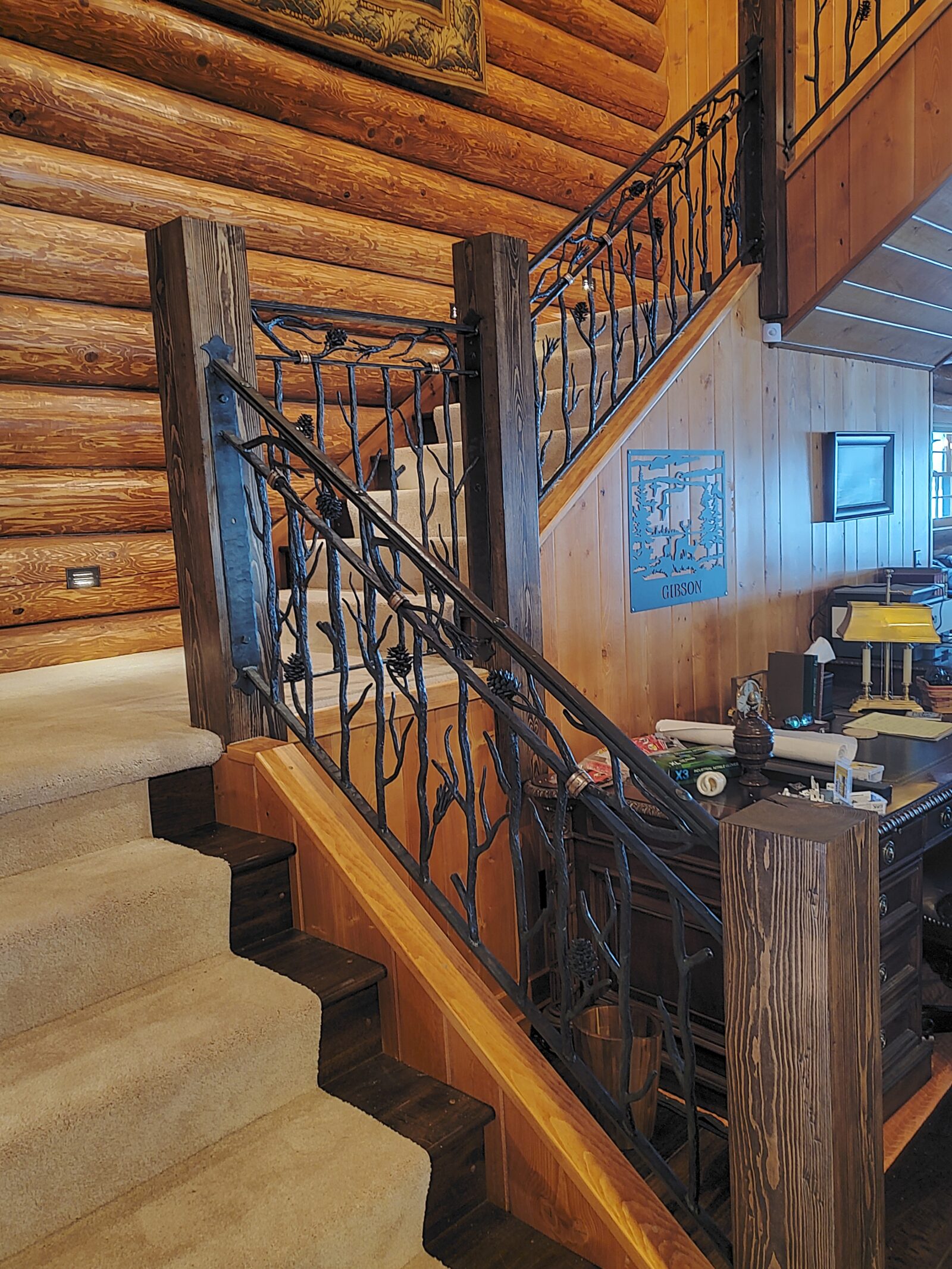 Custom iron railing built by Van Madrone Metalworks for a lake home built by Huisman Concepts