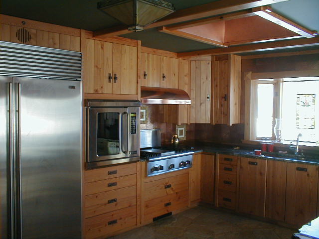 Custom built Doug fir kitchen cabinets and granite counter tops